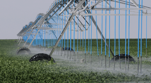 Irrigation Pivot moves over Soybeans